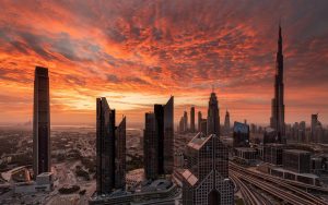 Dubai-skyscrapers-red-sky-clouds-sunset_1920x1200